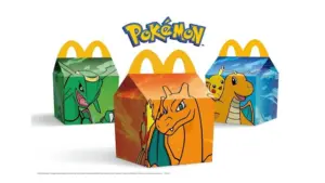 Three McDonald's Happy Meal boxes featuring Pokémon characters and the Pokémon logo.