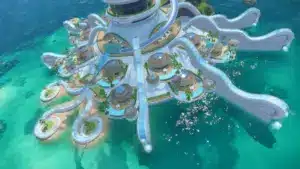 A futuristic tropical resort with white swirling architecture and palm trees over turquoise water.