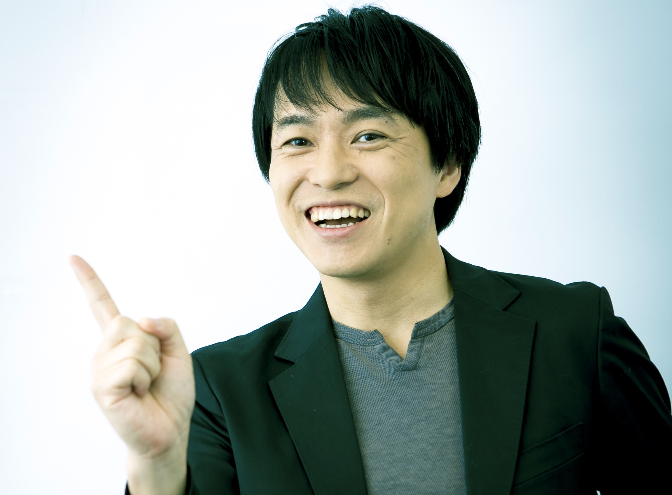Acquire President Takuma Endo smiling