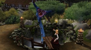 The Sims: Medieval, depicting a Sim feeding a blue pit beast.
