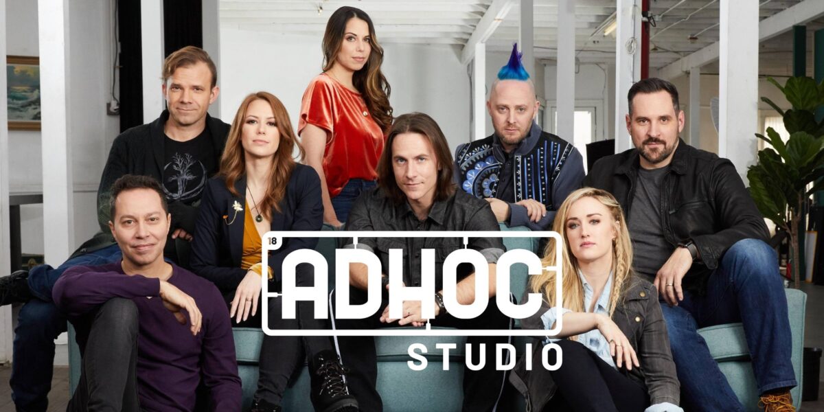Members of Critical Role positioned behind the logo of Adhoc Studios, the Indie Game Studio that will reportedly develop the Critical Role video game