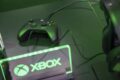 Xbox console next to the Xbox logo
