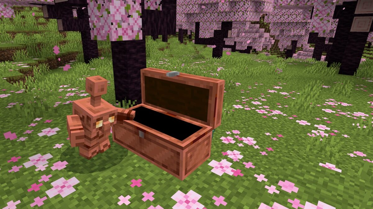 A Copper Golem standing next to a chest, soon to be introduced in the Minecraft Copper Update.