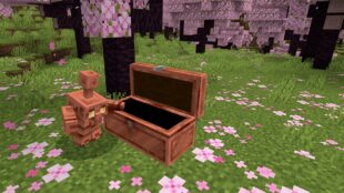 A Copper Golem standing next to a chest, soon to be introduced in the Minecraft Copper Update.